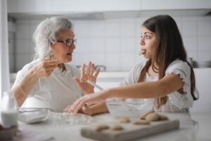 A woman and granddaughter in the kitchen