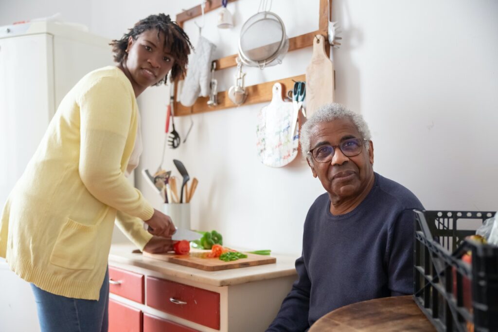 An older man and a carer